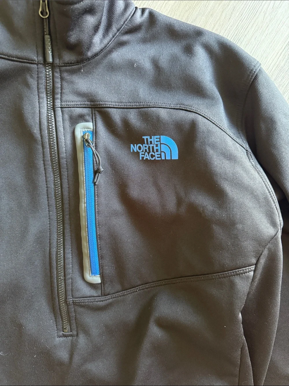The North Face Black Half-Zip Pullover with Blue Chest Zip